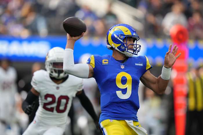 October 15, 2023; Inglewood, California, USA; Los Angeles Rams quarterback Matthew Stafford (9) passes the football against Arizona Cardinals cornerback Marco Wilson (20) during the first quarter at SoFi Stadium. Mandatory Credit: Kyle Terada-USA TODAY Sports